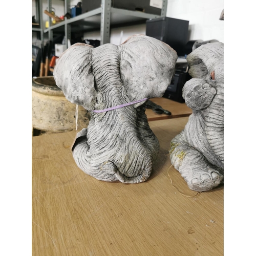 441 - Quantity of three stoneware elephant figures for the garden well cast 25cm high 16cm wide