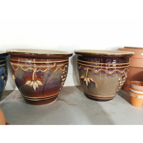 455 - Job lot of glazed and terracotta planters inc four good quality glazed planters 21cm by 26cm a large... 