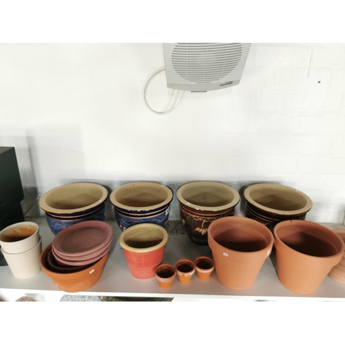 455 - Job lot of glazed and terracotta planters inc four good quality glazed planters 21cm by 26cm a large... 