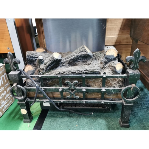 75 - Large electric fire in a cast iron basket with an ornate flue to the top, 111cm high by 64cm wide an... 