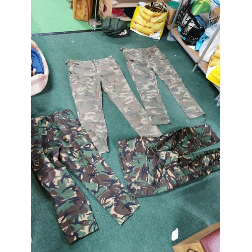 8 - 4 pairs of camouflage combat trousers all size 40w, all in excellent condition