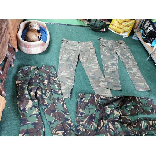 8 - 4 pairs of camouflage combat trousers all size 40w, all in excellent condition