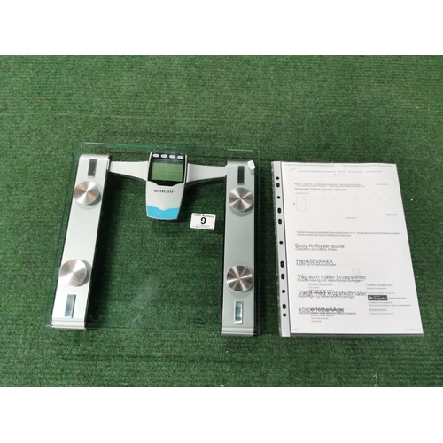 9 - Silvercrest digital weighing scales with its manual