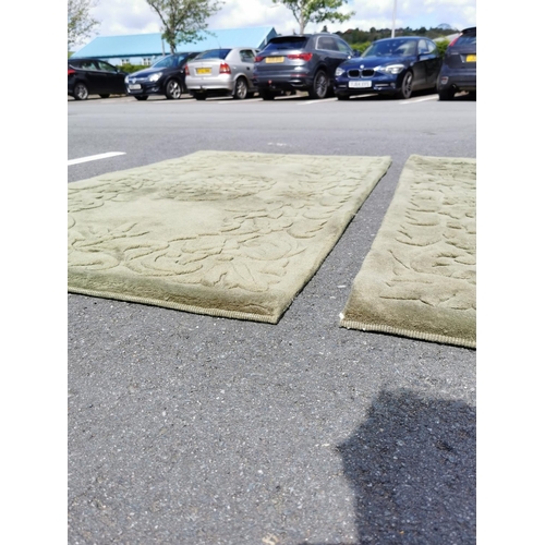 150j - Pair of green very thick pile rugs in good clean condition 155cm by 94cm each