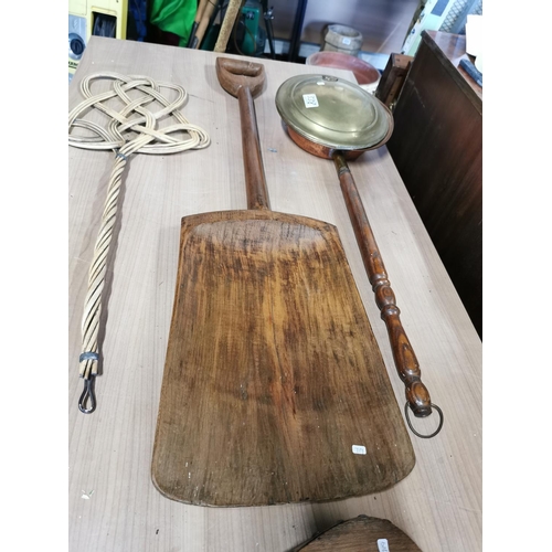 538 - Large antique wooden malt shovel, carpet beater, bed pan and pair of bellows