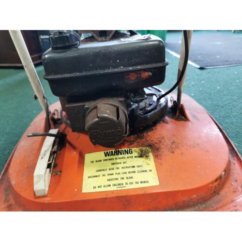 553 - Vintage Flymo petrol mower untested but has good compression