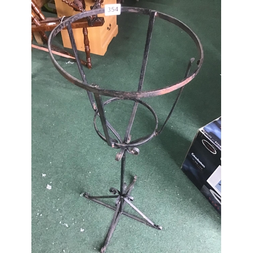 354 - Wrought iron tall planter stands 108cm high with a pot diameter of 30cm