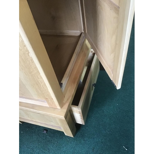 359 - New old stock Solid Oak single door wardrobe with one drawer to base and full hanging
separates into... 