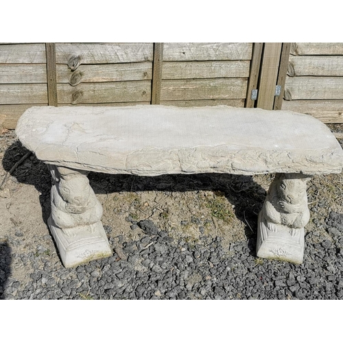 430 - Concrete bench with squirrel formed ends in good condition