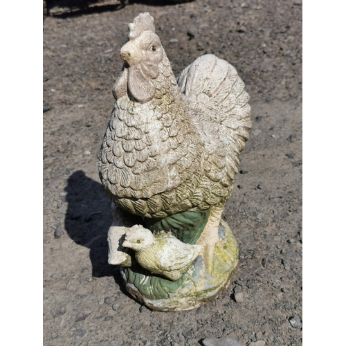 431 - Stoneware hen and chick garden figure small chip to the hens beak,