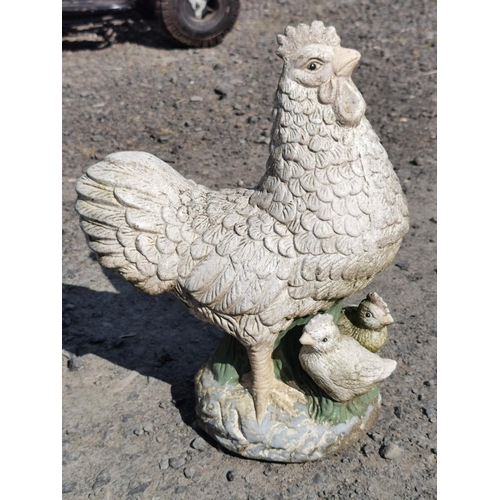 431 - Stoneware hen and chick garden figure small chip to the hens beak,