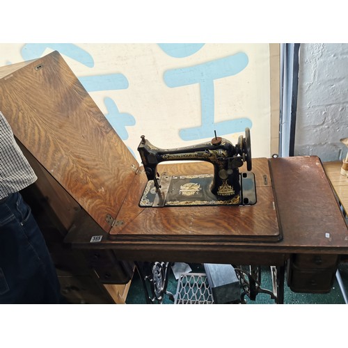 355 - Antique Singer treadle sewing machine table complete with its machine