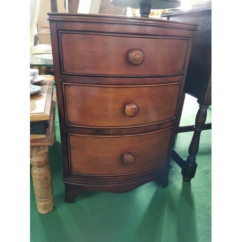 385 - 3 drawer bow fronted bedside chest in mahogany finish