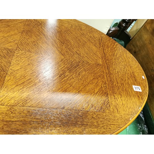 375 - Oak oval coffee table with Queen Ann legs clean top presenting a good grain 44cm high, 66cm wide, 11... 