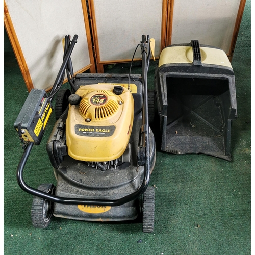 33 - Tallon Power Eagle petrol lawn mower spares or repairs is missing its pull cord