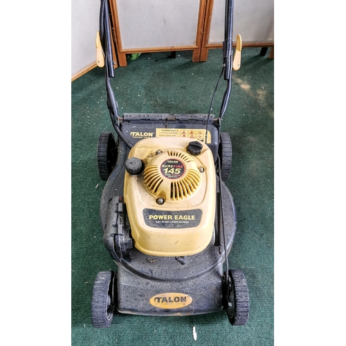 33 - Tallon Power Eagle petrol lawn mower spares or repairs is missing its pull cord