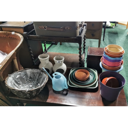 38 - Planter full of plant pots