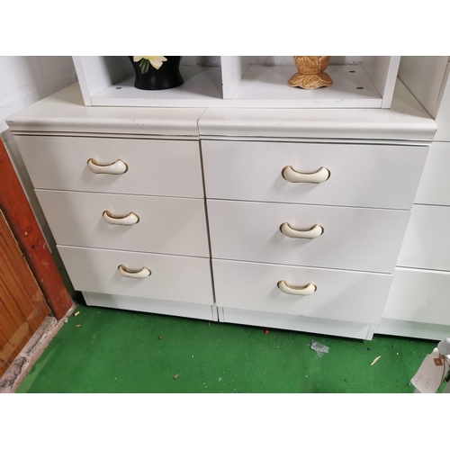 145 - Three piece, white bedroom suite consiting of 5 drawer chest of drawers 2x 3 drawer bedside cabinets... 