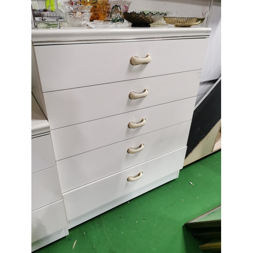 145 - Three piece, white bedroom suite consiting of 5 drawer chest of drawers 2x 3 drawer bedside cabinets... 