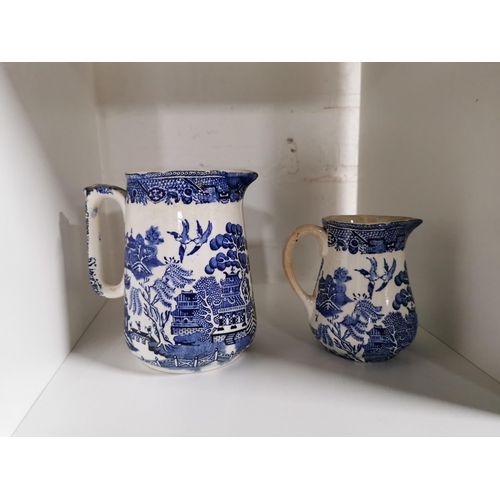 146 - Quantity of collectable jugs and vases inc a syvac jug, a large brentleigh ware jug hand painted blu... 