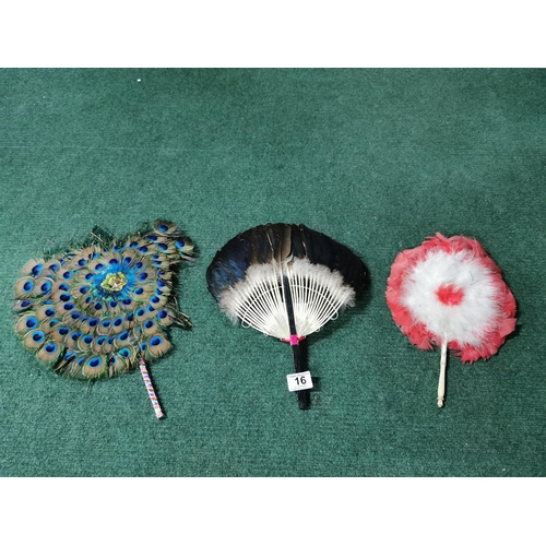 16 - Three vintage feather hand held fans, one has damage