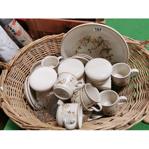 164 - wicker basket containing a dinner set harvest pattern