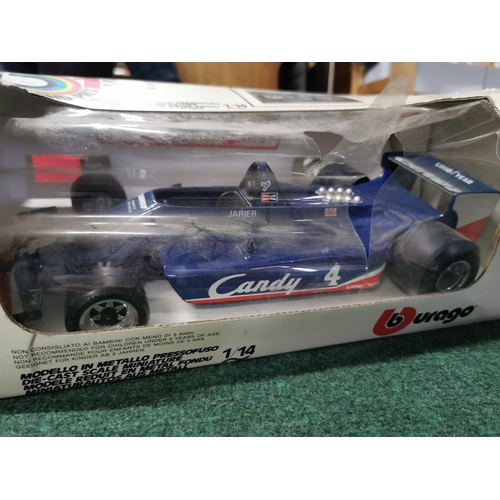 25 - Boxed burago grand prix formula one car along with a large plastic shell tanker lorry