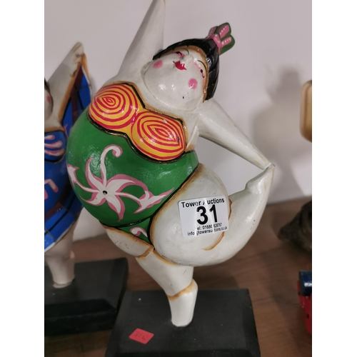 31 - Quantity of 4 unusual japanese dancer figures