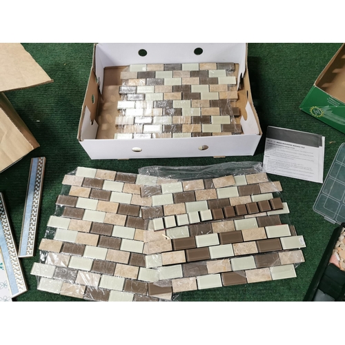 39 - Large quantity of various decorative tiles inc a mesh mounted mosaic tile set