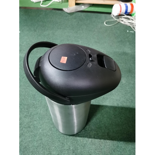 7 - 5 litre vacuum flask on a rotaing base in good condition