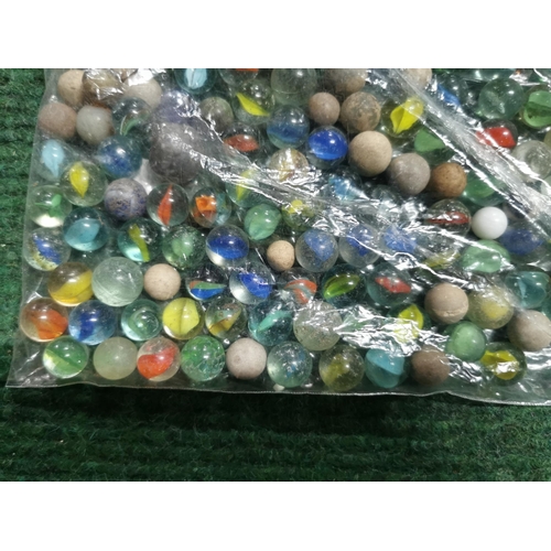 56 - Bag full of various vintage marbles