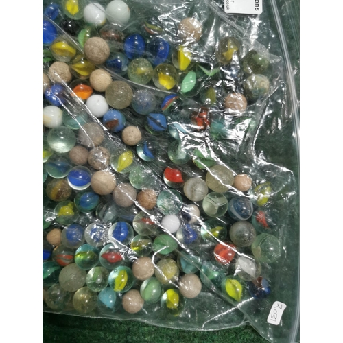 56 - Bag full of various vintage marbles