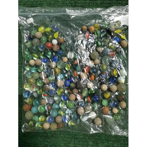 56 - Bag full of various vintage marbles