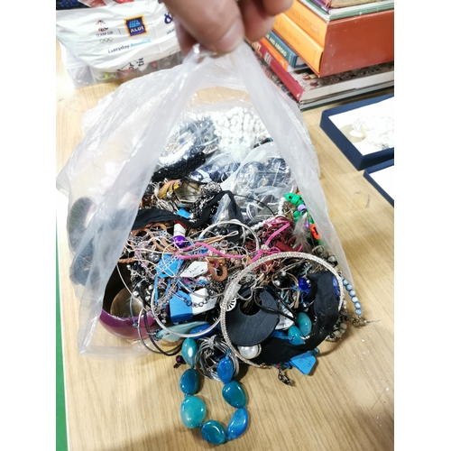 103 - bag containing a very large quantity of costume jewellery