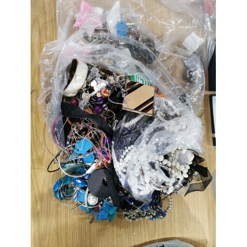 103 - bag containing a very large quantity of costume jewellery