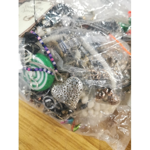 103 - bag containing a very large quantity of costume jewellery