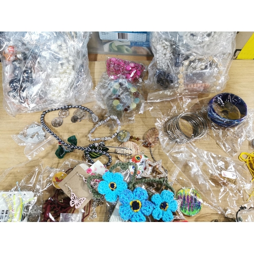 107 - bag containing a very large quantity of various costume jewellery