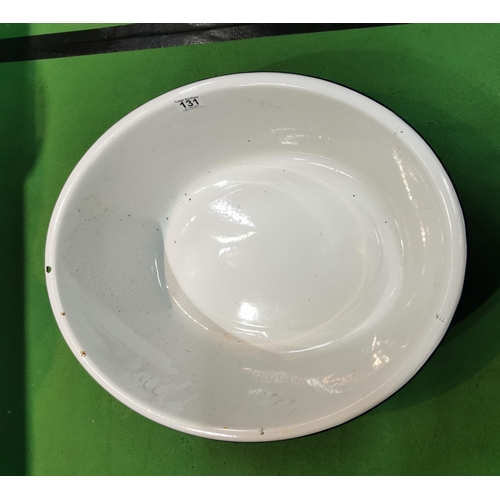 131 - Large oval enamel bath in good condition, Height - 18cm length - 60cm