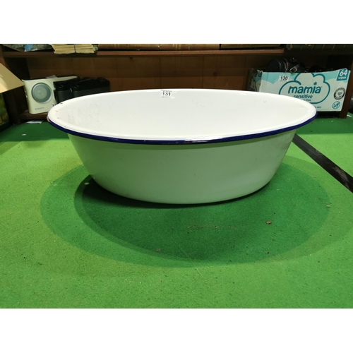 131 - Large oval enamel bath in good condition, Height - 18cm length - 60cm