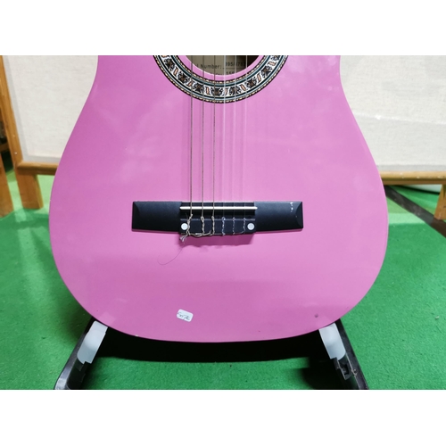 133 - Pink elevation accoustic guitar with stand clean condition