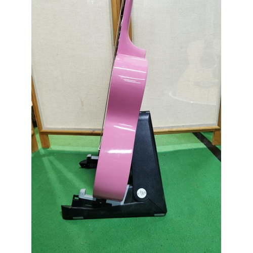 133 - Pink elevation accoustic guitar with stand clean condition