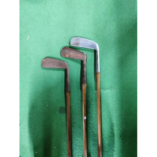 92 - Three early hickory shaft putters