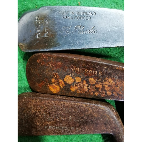 92 - Three early hickory shaft putters