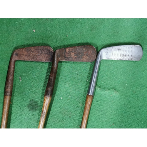 92 - Three early hickory shaft putters