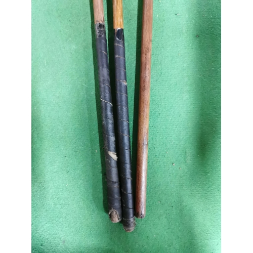 92 - Three early hickory shaft putters