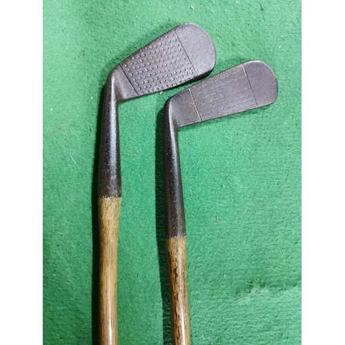 93 - 1917 - 1923 Newtown's first golf pro A. O. Tunley pair of golf clubs both with hickory shafts, putte... 