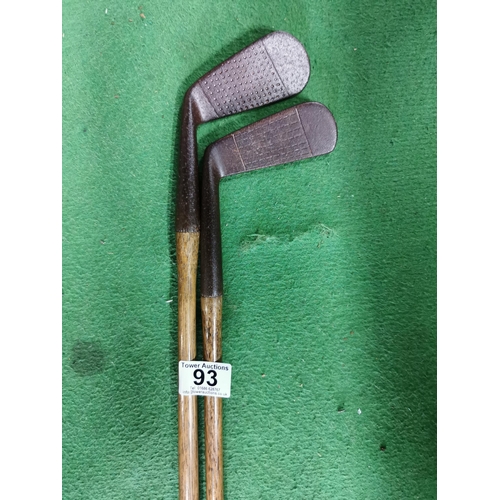 93 - 1917 - 1923 Newtown's first golf pro A. O. Tunley pair of golf clubs both with hickory shafts, putte... 