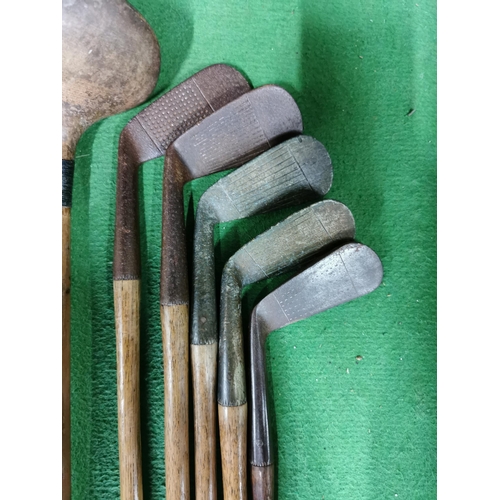 94 - Vintage 1920's 30's golf club set with hickory shafts inc three woods and 5 irons in an original vin... 