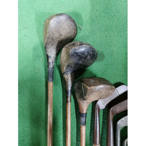 94 - Vintage 1920's 30's golf club set with hickory shafts inc three woods and 5 irons in an original vin... 