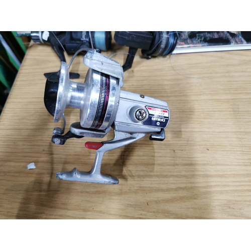 99 - Three fishing reels inc Daiwa 4000c